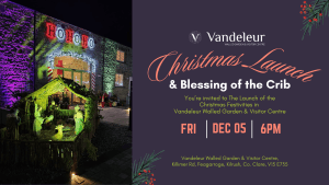 A photograph of a Christmas crib scene featuring figures of Mary, Joseph, and baby Jesus, softly lit with warm festive lighting. Event information for the Christmas Launch and Seasonal Blessing at Vandeleur Walled Garden & Visitor Centre is overlaid on the image.