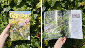 Image of a hand holding up a copy of Irish Garden Magazine with an article featuring Vandeleur Walled Garden & Visitor Centre. Set against a background of green Virginia Creeper leaves.